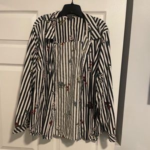 Torrid button up with stripes and multi colored flowers.
